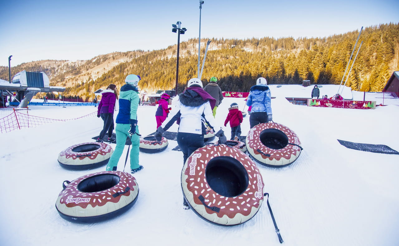 Snowtubing - Flying Donutsen famille